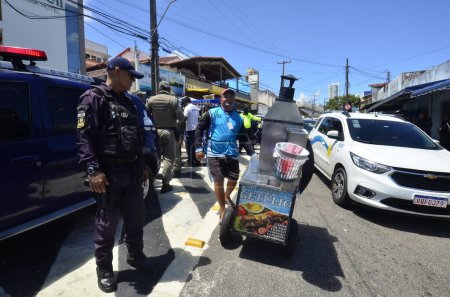 Photo for NATAL (RN), Brazil 03/01/2024 - Unregistered street vendors are prevented from working on Ponta Negra beach in Natal, at the beginning of the summer 2024 operation and with the presence of the military police - Royalty Free Image