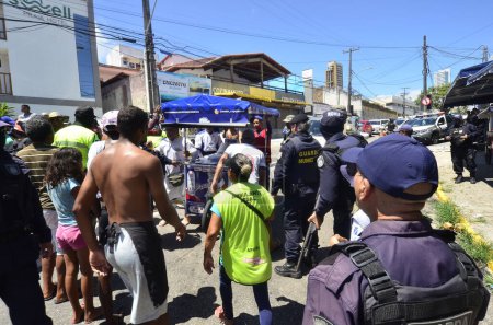 Photo for NATAL (RN), Brazil 03/01/2024 - Unregistered street vendors are prevented from working on Ponta Negra beach in Natal, at the beginning of the summer 2024 operation and with the presence of the military police - Royalty Free Image