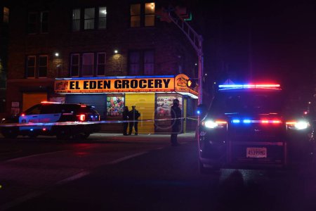 Photo for Shooting investigation in Newark, New Jersey. January 4, 2024, Newark, New Jersey, USA: Several people were reported suffering from gunshot wounds and fatalities were reported in a shooting near El Eden Grocery store - Royalty Free Image