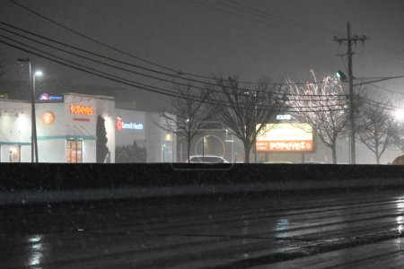 Photo for New York City And New Jersey's First Snowfall Of 2024. January 6, 2024, Paramus, New Jersey, USA: First snowstorm of 2024 impacts the New York City metropolitan area in the cities of Fair Lawn, Englewood and Paramus in the State of New Jersey. - Royalty Free Image