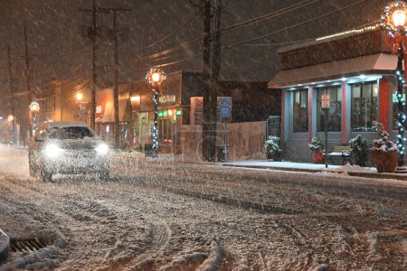 Photo for New York City And New Jersey's First Snowfall Of 2024. January 6, 2024, Paramus, New Jersey, USA: First snowstorm of 2024 impacts the New York City metropolitan area in the cities of Fair Lawn, Englewood and Paramus in the State of New Jersey. - Royalty Free Image