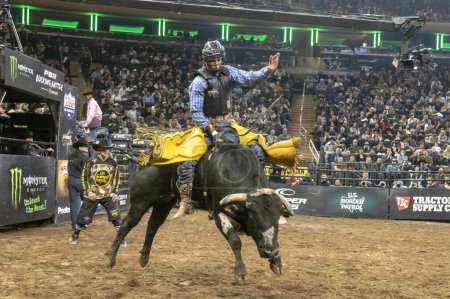 Photo for 2024 Professional Bull Riders At The Garden. January 6, 2024, New York, New York, USA: Julio Cesar Marques rides Buster during second round of the Professional Bull Riders 2024 Unleash The Beast event at Madison Square Garden - Royalty Free Image