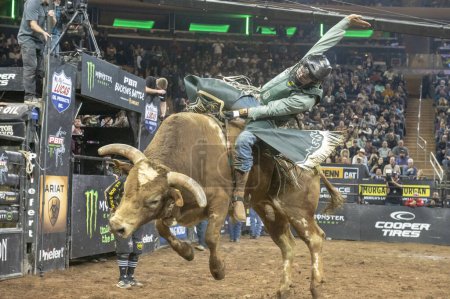 Photo for 2024 Professional Bull Riders At The Garden. January 6, 2024, New York, New York, USA: Koltin Hevalow rides Hoka Hey during second round of the Professional Bull Riders 2024 Unleash The Beast event at Madison Square Garden on January 6, 2024 - Royalty Free Image
