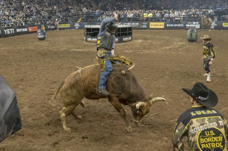 Photo for 2024 Professional Bull Riders At The Garden. January 6, 2024, New York, New York, USA: Paulo Eduardo Rossetto rides Martins Maniac during second round of the Professional Bull Riders 2024 Unleash The Beast event at Madison Square Garden - Royalty Free Image