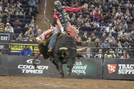 Photo for 2024 Professional Bull Riders At The Garden. January 6, 2024, New York, New York, USA: Silvano Alves rides Crossover during second round of the Professional Bull Riders 2024 Unleash The Beast event at Madison Square Garden on January 6, 2024 - Royalty Free Image
