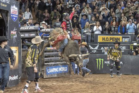 Photo for 2024 Professional Bull Riders At The Garden. January 6, 2024, New York, New York, USA: Silvano Alves rides Lapua during second round of the Professional Bull Riders 2024 Unleash The Beast event at Madison Square Garden on January 6, 2024 - Royalty Free Image