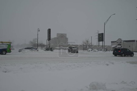 Photo for Blizzard affects the U.S. State of Iowa in Cedar Rapids, Iowa. January 12, 2024, Cedar Rapids, Iowa, USA: Blizzard warnings were in affect in Cedar Rapids, Iowa, Friday as treacherous conditions impacted roadways throughout the area - Royalty Free Image