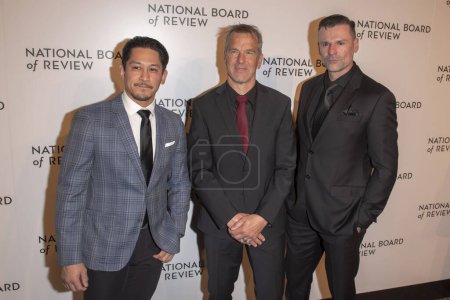 Photo for 2024 National Board of Review Awards Gala. January 11, 2024, New York, New York, USA: (L-R) Jeremy Marinas, Scott Rogers and Stephen Dunlevy attend the 2024 National Board of Review Gala at Cipriani 42nd Street on January 11, 2024 in New York - Royalty Free Image