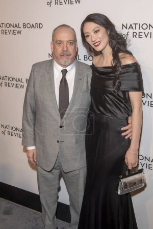 Photo for 2024 National Board of Review Awards Gala. January 11, 2024, New York, New York, USA: Paul Giamatti and Clara Wong attend the 2024 National Board of Review Gala at Cipriani 42nd Street on January 11, 2024 in New York City. - Royalty Free Image