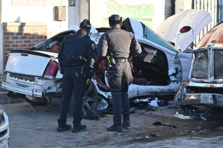Photo for Fatal vehicle collision in Bronx, New York. January 21, 2024, Bronx, New York, USA: Approximately 3:18 am, Sunday morning at Bryant Avenue and Viele Avenue, a 24-year-old male operating a white Chrysler failed to properly navigate the roadway - Royalty Free Image