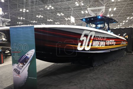 Photo for (New) New York Boat Show in New York. January 25, 2024, New York, USA: The NY boat show is held in Javits Center from January 24 to 28, showing United States and international business stuff related to boats construction, canoeing, diving, motor boat - Royalty Free Image