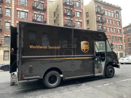 Photo for UPS plans to eliminate 12,000 jobs to reduce costs. January 31, 2023, New York, USA:  UPS announces it will be eliminating about 12,000 jobs so as to reduce costs by about $1 billion - Royalty Free Image