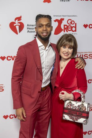 Photo for The American Heart Association's Red Dress Collection Concert 2024. January 31, 2024, New York, New York, USA: (L-R) Damar Hamlin and AHA CEO Nancy Brown attend The American Heart Association's Red Dress Collection Concert 2024 - Royalty Free Image