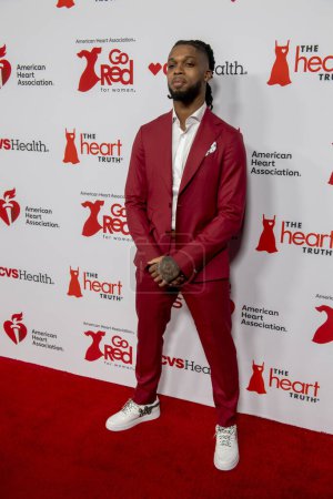 Photo for The American Heart Association's Red Dress Collection Concert 2024. January 31, 2024, New York, New York, USA: Damar Hamlin attends The American Heart Association's Red Dress Collection Concert 2024 at Jazz at Lincoln Center - Royalty Free Image