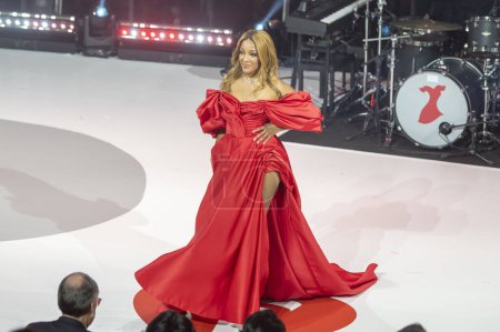 Photo for The American Heart Association's Red Dress Collection Concert 2024. January 31, 2024, New York, New York, USA: Mickey Guyton wearing Monetre walks the runway during The American Heart Association's Red Dress Collection Concert 2024 - Royalty Free Image