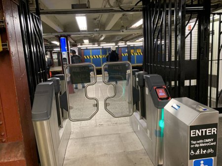 Photo for New Subway Fare Gates for safety and fare evasion in New York City. February 1, 2024, New York, USA: The New York Metropolitan Iransportation Authority is installing new subway fare gates in some subways as pilots; testing the effectiveness - Royalty Free Image
