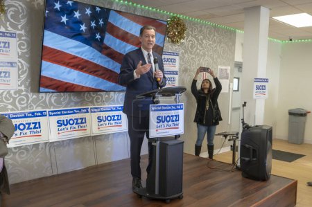 Photo for Tom Suozzi Holds A Campaign Rally. February 4, 2024, Floral Park, New York, USA: Tom Suozzi speaks at an election rally on February 04, 2024 in Floral Park, New York.   Early voting started Saturday February 3 for special election - Royalty Free Image