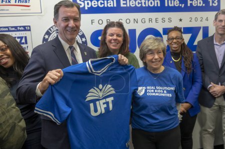 Photo for Tom Suozzi Holds A Campaign Rally. February 4, 2024, New York, New York, USA: Tom Suozzi poses with President of the American Federation of Teachers Randi Weingarten at an election rally in Bayside on February 04, 2024 in the Queens borough - Royalty Free Image