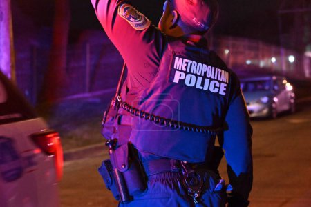 Photo for Police shoot suspect in a police-involved shooting in Washington, D.C. February 9, 2024, Washington, DC, USA: Police were on patrol in the area of Bangor Street, Southeast. Police attempted to make contact with a suspect in the alley - Royalty Free Image