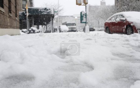 Photo for Heavy snow slams the New York and Northeast, bringing travel hazards and flight delays. February 13, 2024, New York, USA: New York City and northeast have been hit with heavy snow bringing along travel hazards and flight delays and difficulties - Royalty Free Image