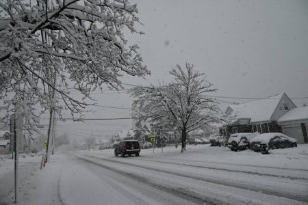Photo for Snowstorm affects Fair Lawn High School in Fair Lawn, New Jersey. February 13, 2024, Fair Lawn, New Jersey, USA: Snowstorm leads to no school and no classes at Fair Lawn High School in Fair Lawn, New Jersey due to the heavy falling snow - Royalty Free Image