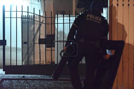 Photo for FBI and United States Secret Service officers raid the Venezuelan Ambassador's Residence in Washington, DC. February 15, 2024, Washington, DC, USA: Heavy police activity could be seen in the area and FBI agents had raid jackets - Royalty Free Image
