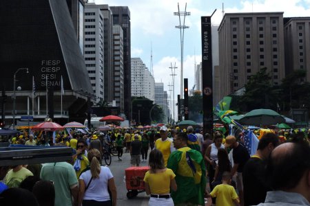 Photo for Sao Paulo (SP), Brazil 02/25/2024 - Protesters arrive on Avenida Paulista for an event called by the former President of Brazil Jair Bolsonaro, on the afternoon of this Sunday, February 25, 2024. - Royalty Free Image