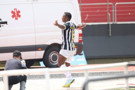 Photo for Sao Paulo (SP), 02/25/2024 - Alfredo Morelos do Santos scores and celebrates his goal in a match between Santos and Sao Bernardo, in the tenth round of the Campeonato Paulista at Morumbis - Royalty Free Image