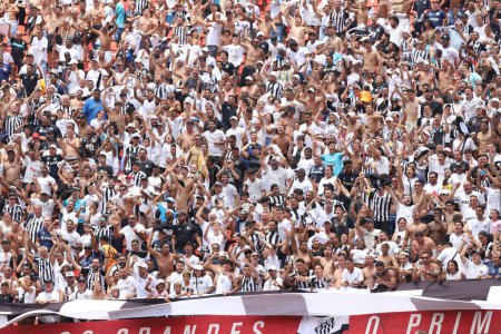 Photo for Sao Paulo (SP), 02/25/2024 - Willian Bigode do Santos scores and celebrates his goal in a match between Santos and Sao Bernardo, in the tenth round of the Campeonato Paulista at Morumbis - Royalty Free Image