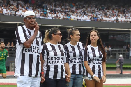 Photo for Sao Paulo (SP), 02/25/2024 -  Former Santos player Serginho Chulapa receives a tribute from the President of Santos Marcelo Texeira in celebration of the 40th anniversary of his goal against Corinthian - Royalty Free Image