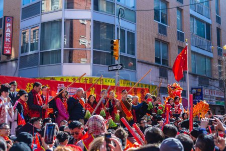 Photo for NEW YORK - FEBRUARY 25: People wearing different costumes participate in the annual Lunar New Year parade in Chinatown on February 25, 2024 in New York City. People gathered to enjoy and celebrate the 26th annual Lunar New Year parade - Royalty Free Image