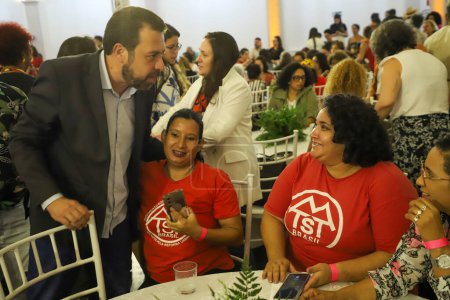 Photo for Sao Paulo, Brazil - 03/08/2024: Deputy mayor Guilherme Boulos participates on Friday (8) in a breakfast with around 200 women at Club Homs. Held on International Women's Day, the event was attended by businesswomen, artists - Royalty Free Image