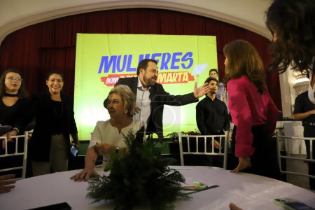 Photo for Sao Paulo, Brazil - 03/08/2024: Deputy Guilherme Boulos and former mayor Marta Suplicy participate on Friday (8) in a breakfast with around 200 women at Club Homs. Held on International Women's Day, the event was attended by businesswomen, artists - Royalty Free Image