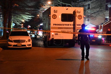 Photo for (NEW) Fatal shooting in Newark, New Jersey. March 7, 2024, Newark, New Jersey, USA: One person was pronounced dead after being fatally shot in the area of S 14th St. around 7:30 PM, Thursday evening in Newark, New Jersey. - Royalty Free Image