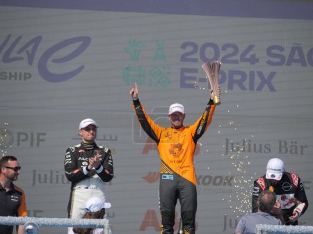 Photo for SAO PAULO (SP), Brazil 03/16/2024 - Emerson Fittpaldi presents the trophy on the podium of the Formula E 2024 Sao Paulo E-Prix, this Saturday, March 16, 2024, at the Anhembi complex , north zone of Sao Paulo. - Royalty Free Image