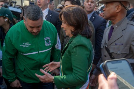Photo for St. Patrick's Day Parade in New York City.  March 16, 2024, New York, New York, USA: New York State Governor Kathy Hochul (R) talks with New York City. Police Commissioner Edward Caban (L) - Royalty Free Image