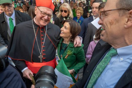 Photo for St. Patrick's Day Parade in New York City.  March 16, 2024, New York, New York, USA: (L-R) Archbishop of New York, Cardinal Timothy Dolan greets New York State Governor Kathy Hochul in the St. Patrick's Day Parade - Royalty Free Image