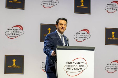 Photo for The New York International Auto Show 2024. March 27, 2024, New York, New York, USA: Jose Munoz, global president and COO of Hyundai Motor Company and the president and CEO of Hyundai and Genesis Motor North America, receives the 2024 - Royalty Free Image