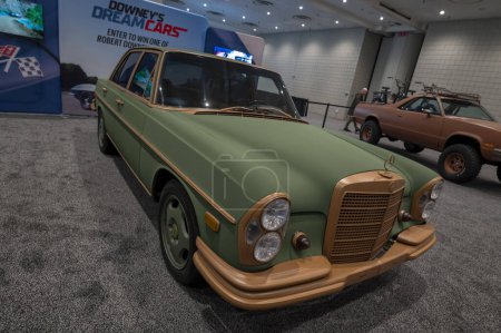 Photo for The New York International Auto Show 2024. March 27, 2024, New York, New York, USA: A 1969 Mercedes-Benz 280SE one of the six cars converted to drive to a pollution-free part of Robert Downey Jr. Dream Cars to be given away - Royalty Free Image
