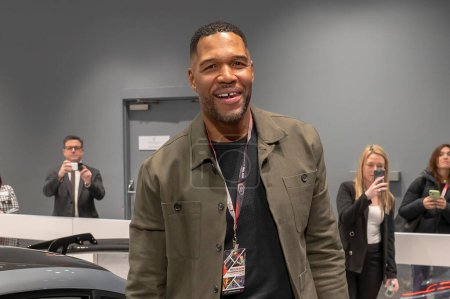 Photo for The New York International Auto Show 2024. March 27, 2024, New York, New York, USA: Michael Strahan receives delivery of his Daydream car during the International Auto Show press preview at the Jacob Javits Convention Center on March 27, 2024 - Royalty Free Image