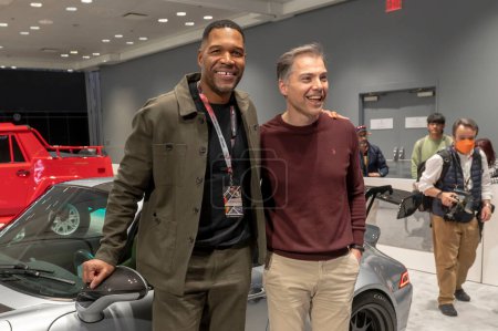 Photo for The New York International Auto Show 2024. March 27, 2024, New York, New York, USA: Michael Strahan and Goran Turkic pose during the International Auto Show press preview at the Jacob Javits Convention Center on March 27, 2024 in New York City. - Royalty Free Image