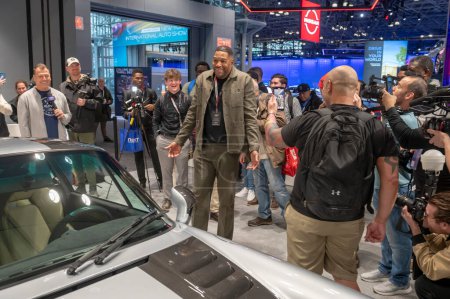Photo for The New York International Auto Show 2024. March 27, 2024, New York, New York, USA: Michael Strahan receives delivery of his Daydream car during the International Auto Show press preview at the Jacob Javits Convention Center on March 27, 2024 - Royalty Free Image