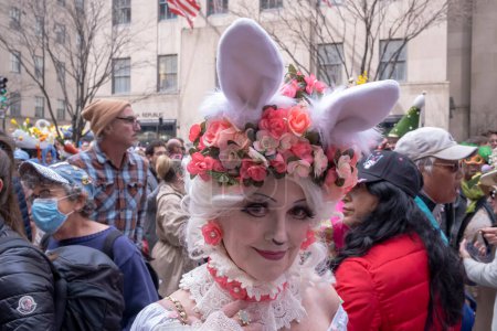 Photo for Easter Bonnet Parade. March 31, 2024, New York, New York, USA: A woman dress as an Easter Bunny attends the Easter Parade and Bonnet Festival 2024 outside St. Patrick's Cathedral - Royalty Free Image