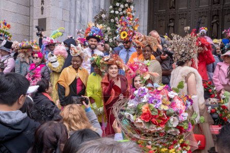 Photo for Easter Bonnet Parade. March 31, 2024, New York, New York, USA: People wearing costumes and lavishly decorated hats crowding on the steps of St. Patrick's Cathedral during the Easter Parade - Royalty Free Image
