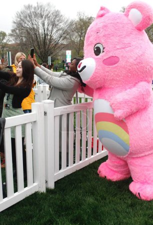 Photo for The character entertains people at the event. April 01, 2024, Washington DC, Maryland, USA: The 2024 White House Easter Egg Roll taking place at the South Lawn on Easter Monday, April 1st, continuing one of the oldest traditions in White House - Royalty Free Image