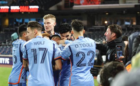Photo for MLS: NYCFC vs Atlanta. April 06, 2024, New York, USA: Santiago Rodriguez scored penalty and celebrates with team players for NYCFC during soccer game between NYCFC and Atlanta United FC during MLS regular season at Citifield in New York - Royalty Free Image