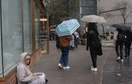 Photo for (NEW) Heavy Rain Drops on New York . April 11, 2024, New York, USA: New Yorkers and tourists are faced with heavy rainfall from Thursday (11) afternoon through all day on  Friday (12). - Royalty Free Image