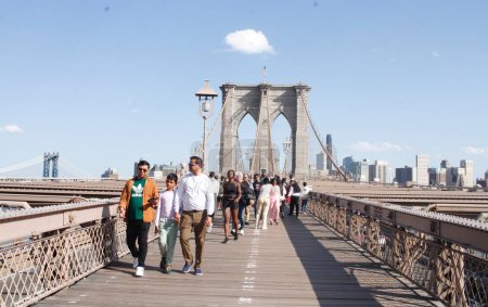 Photo for Pro Palestine Protest On Brooklyn Bridge. April 15, 2024, New York, USA: NYPD was able to disperse Pro Palestine Protesters who were protesting and attempted blocking traffic on Brooklyn Bridge demanding ceasefire and end to the Israel - Royalty Free Image