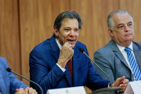 Photo for Brasilia (DF), 04/22/2024 - Minister of Finance, Fernando Haddad (e) and the Minister of Entrepreneurship, Marcio Franca (d), in a press conference after the Launch Ceremony of the Believe Program - Royalty Free Image