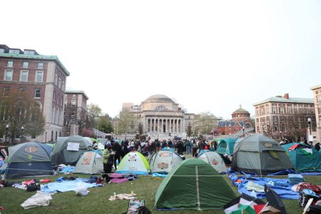 Photo for Inside the Columbia Encampment for Palestine. April 21, 2024. New York, USA: Columbia students and faculty gather to take over the lawn at Columbia and have bult a camp on campus - Royalty Free Image